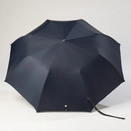 Navy blue folding umbrella, open