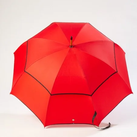 Red windproof umbrella, open