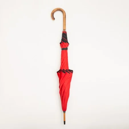 Red windproof umbrella, closed