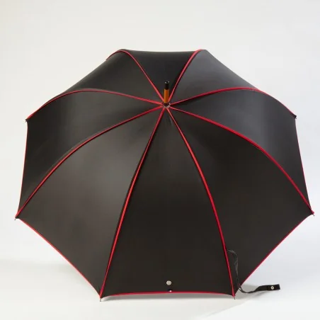 Schwarzer Stockschirm mit rotem Band, offen