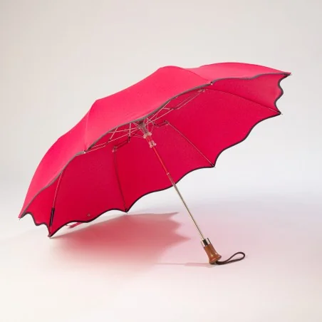 Automatic opening folding parasol, raspberry with grey trim, side view