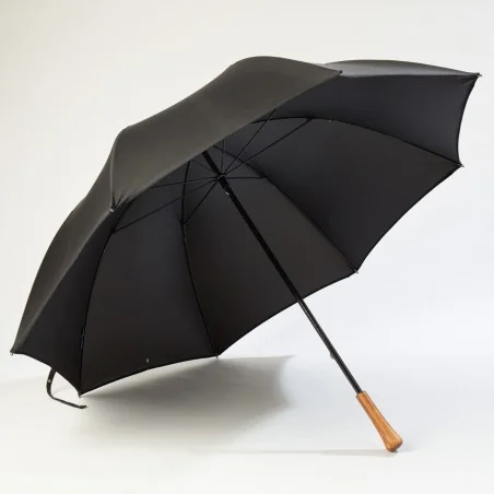 Black golf umbrella, open at the front