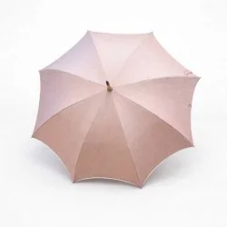 Chic pink UV-protective parasol with beige trim, viewed from the front