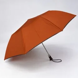terracotta folding umbrella opened on the side