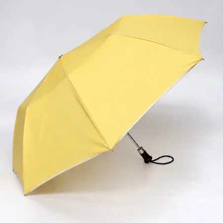 parapluie pliant jaune ouvert de coté